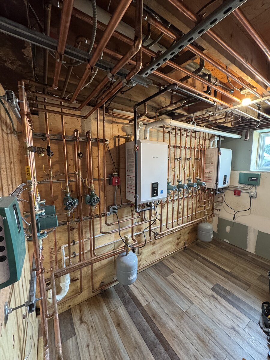 New copper piping and heating equipment installed in a Brooklyn renovation